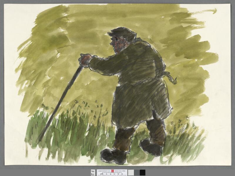 Farmer with stick in a field