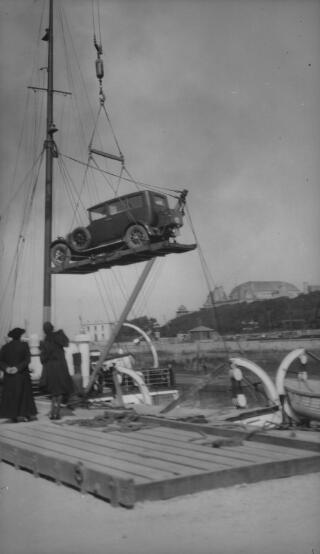 D Ll G's Rolls Royce on a hoist.