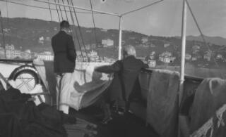 David Lloyd George and Sir Thomas Carey Evans aboard 'Sabrina' enjoying the view of nearby Santa Margherita Ligure, Italy.