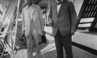 David Lloyd George ar fwrdd llong gyda dyn anhysbys