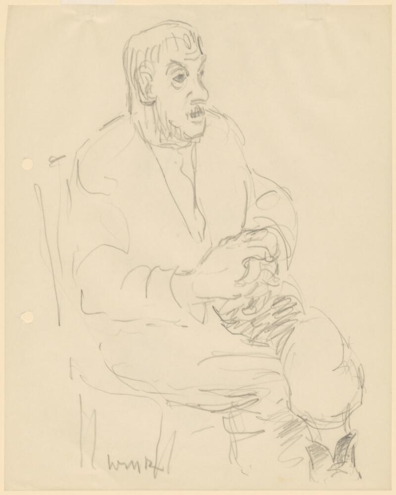Portrait of a man sitting in a chair